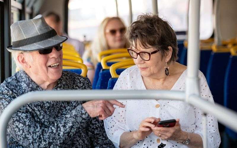 Older couple riding the bus