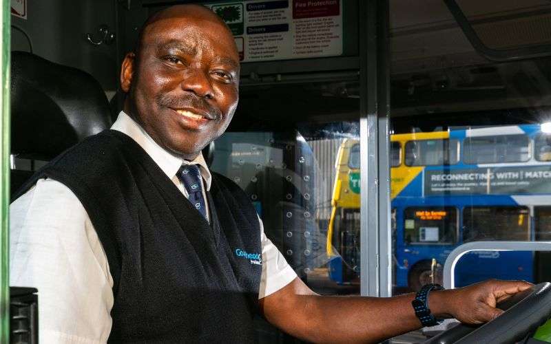 GoAhead bus driver in a drivers cab